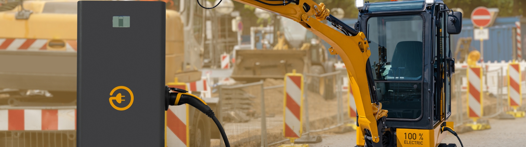Rechargeable yellow and black construction machine with charging station